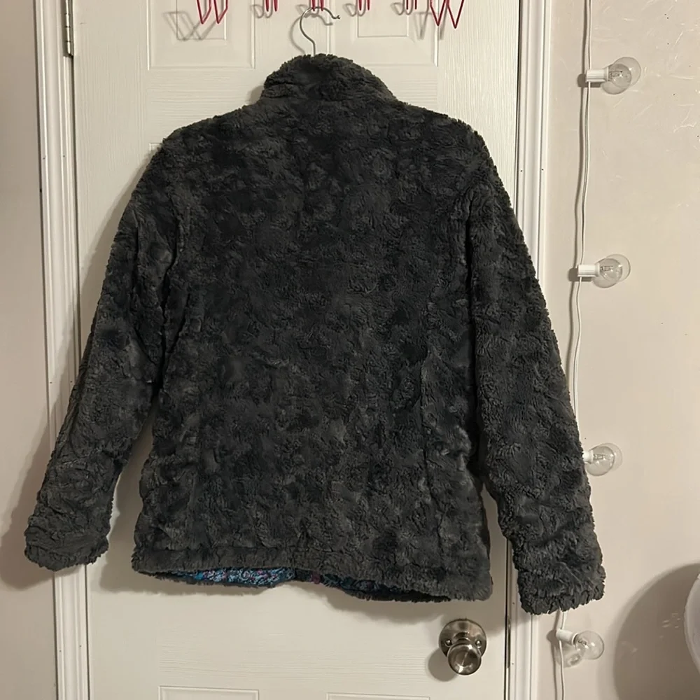 The North Face girl’s Mossbud Swirl Blue Gray Reversible Coat